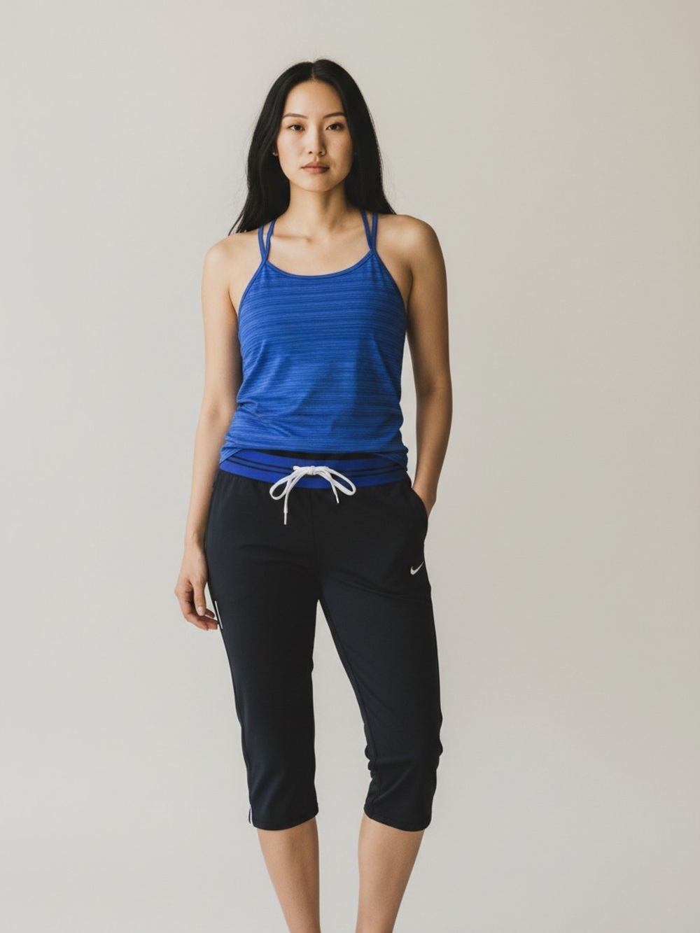 Nike Women’s Black and Purple Athletic Capris with Tank Top